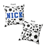 Image showing front of soccer ball covered square throw pillow,  with the name 'NICK' in blue varsity font across the front. The back of the pillow has the soccer balls all over without the name. 