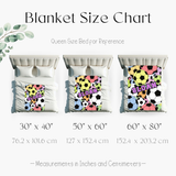 Blanket size chart graphic showing three bed setups with colorful soccer-themed blankets labeled for reference on a Queen size bed, with dimensions listed below each.