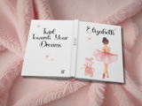 A custom hardcover book or journal shown open on a pink faux fur background. The left cover reads 'Twirl Towards Your Dreams' in black script with pink star accents, and the right cover features a watercolor ballerina in a pink tutu next to pink ballet slippers, with the name 'Elizabeth' at the top.