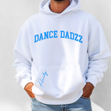 A white pullover hoodie with 'DANCE DADZZ' printed in blue arched letters across the chest and a blue script signature on the front pocket, shown on a model wearing blue jeans.