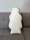 Back of the football player shaped throw pillow - it's all white. 