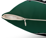 Close-up of a dark green textured throw pillow with a partially unzipped cream zipper, showing the off-white fabric lining.