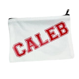 white zippered canvas case with the name 'caleb' diagonally across the case in a red varsity font. 